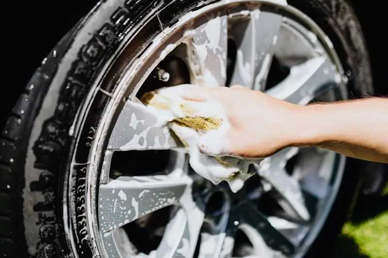 Sponge washing an alloy wheel