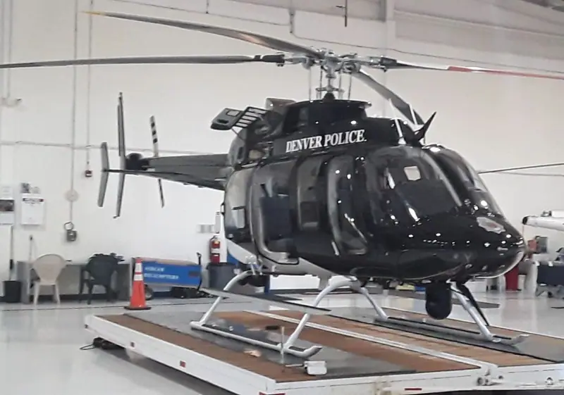 Helicopter with glossy paint in a hangar