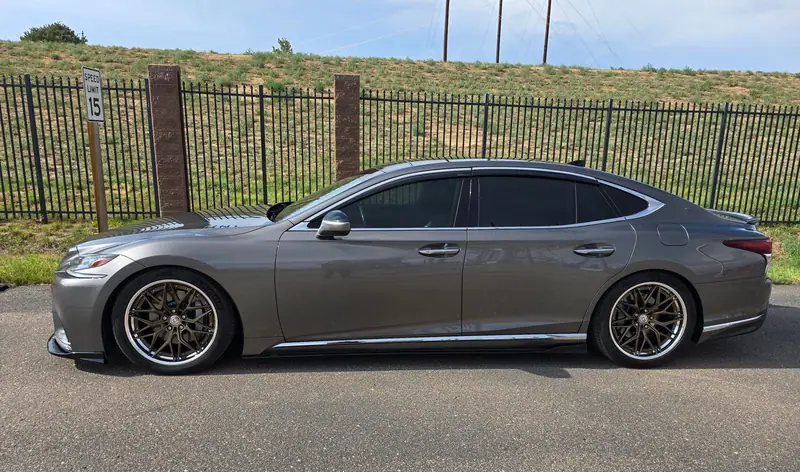 Gray Lexus LS side profile with glossy paint