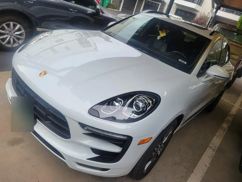 White Porsche Macan before its wrap