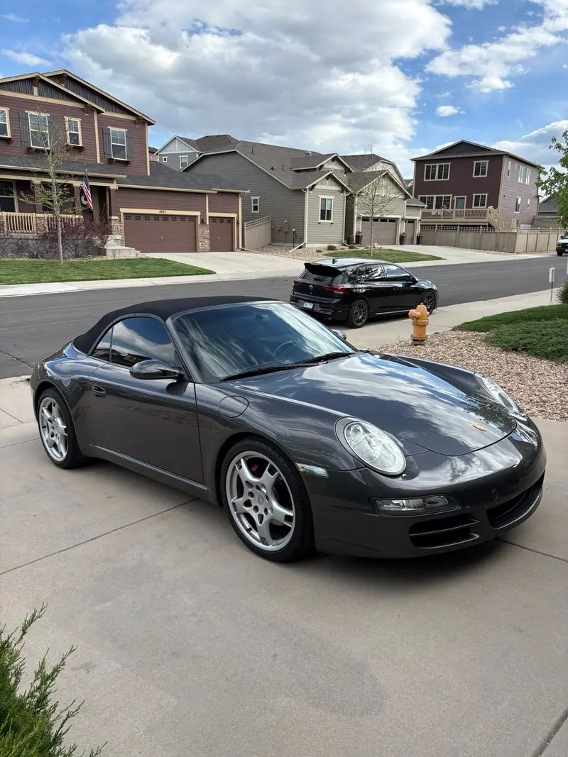 Gray Porsche 911 on a driveway, from Patriot Ceramics job photos